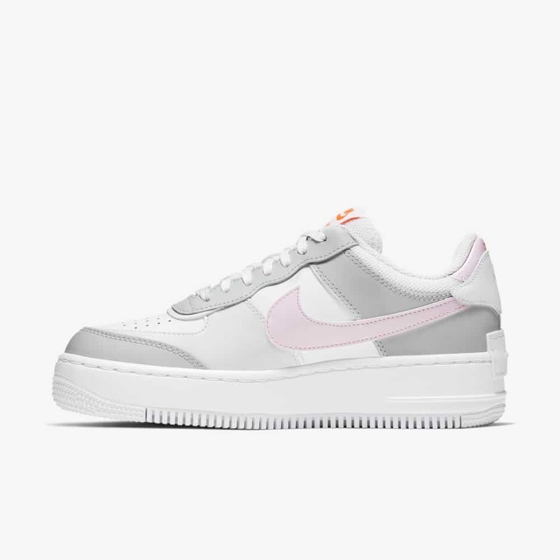 Grey nike shoes with pink outlet swoosh